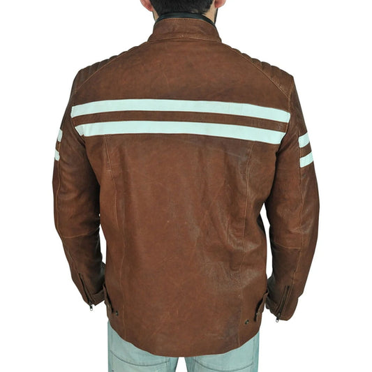 A man viewed from the back wearing a brown leather jacket with two horizontal light blue stripes across the shoulders and upper arms, paired with light blue jeans against a plain white background.