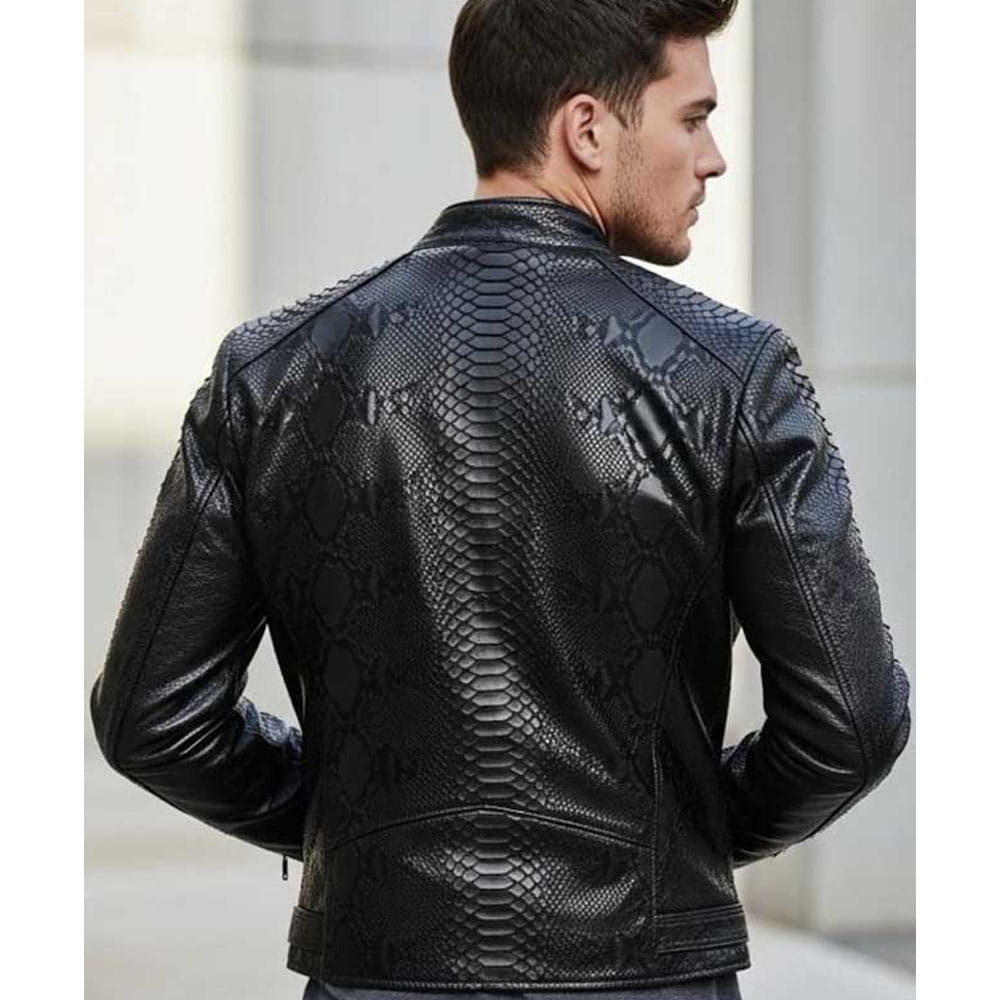 A man wearing a black textured leather jacket with a snakeskin pattern, shown from the back in a city setting.