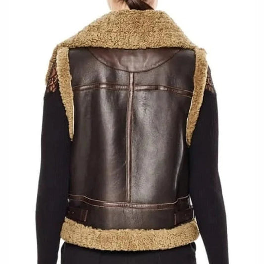 Brown leather vest with beige fur lining on a white background