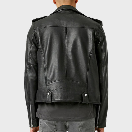 Black leather jacket worn by a person on a light gray background