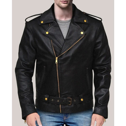 A man wearing a black leather motorcycle jacket with gold-tone hardware, including snap buttons, zipper details, and a matching belt, paired with blue jeans against a solid light gray background.