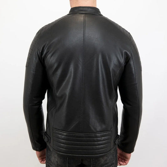 A man viewed from the back wearing a black leather jacket, showing the back panel stitching and ribbed waist detail against a plain white background.
