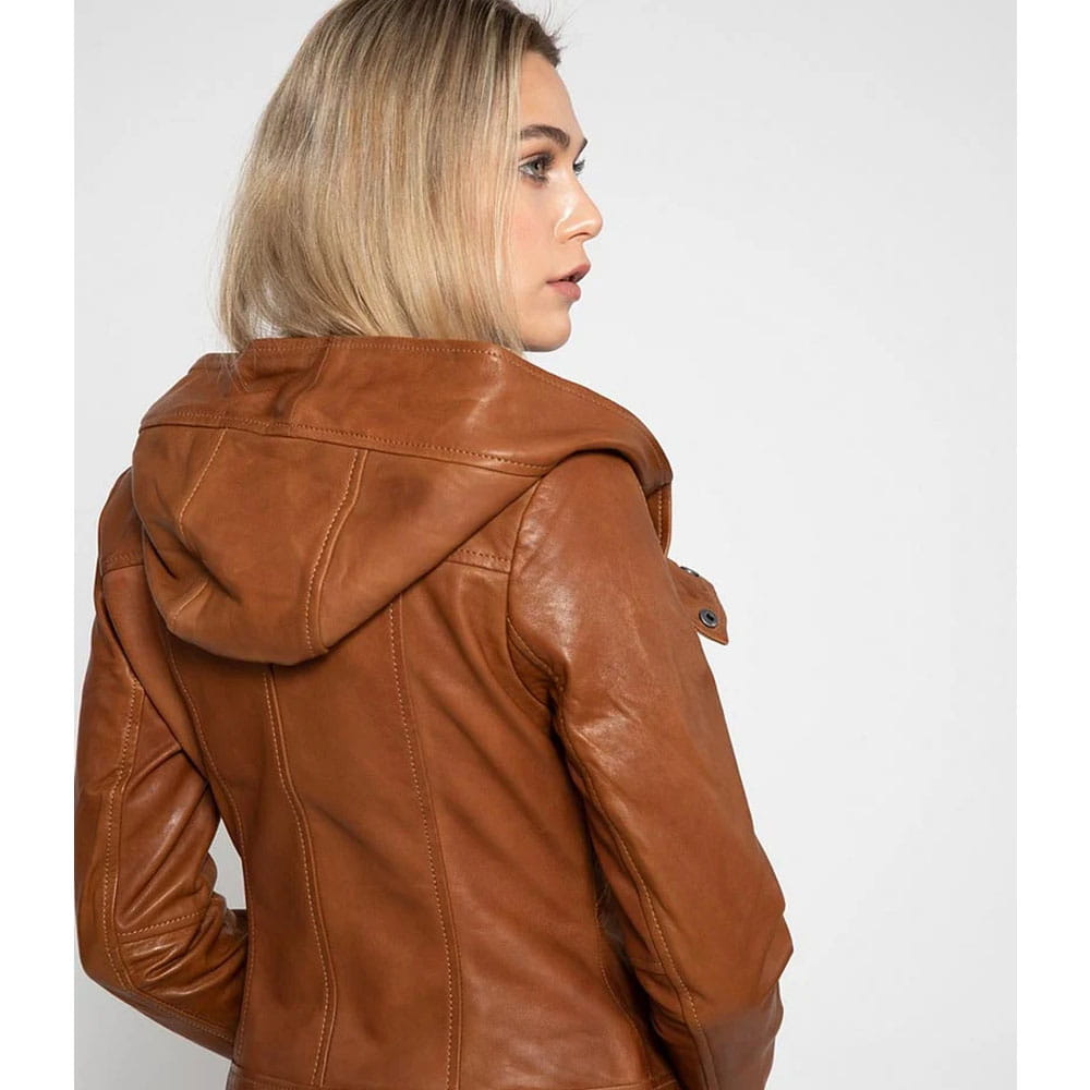 A woman shown from the back wearing a brown faux-leather hooded jacket against a light gray studio background.