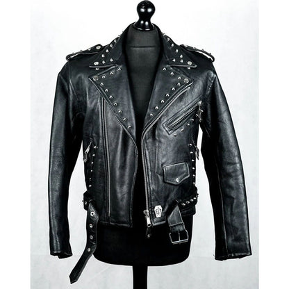 Black leather motorcycle jacket with silver studs and a skull buckle detail, displayed on a black mannequin torso against a light gray background.