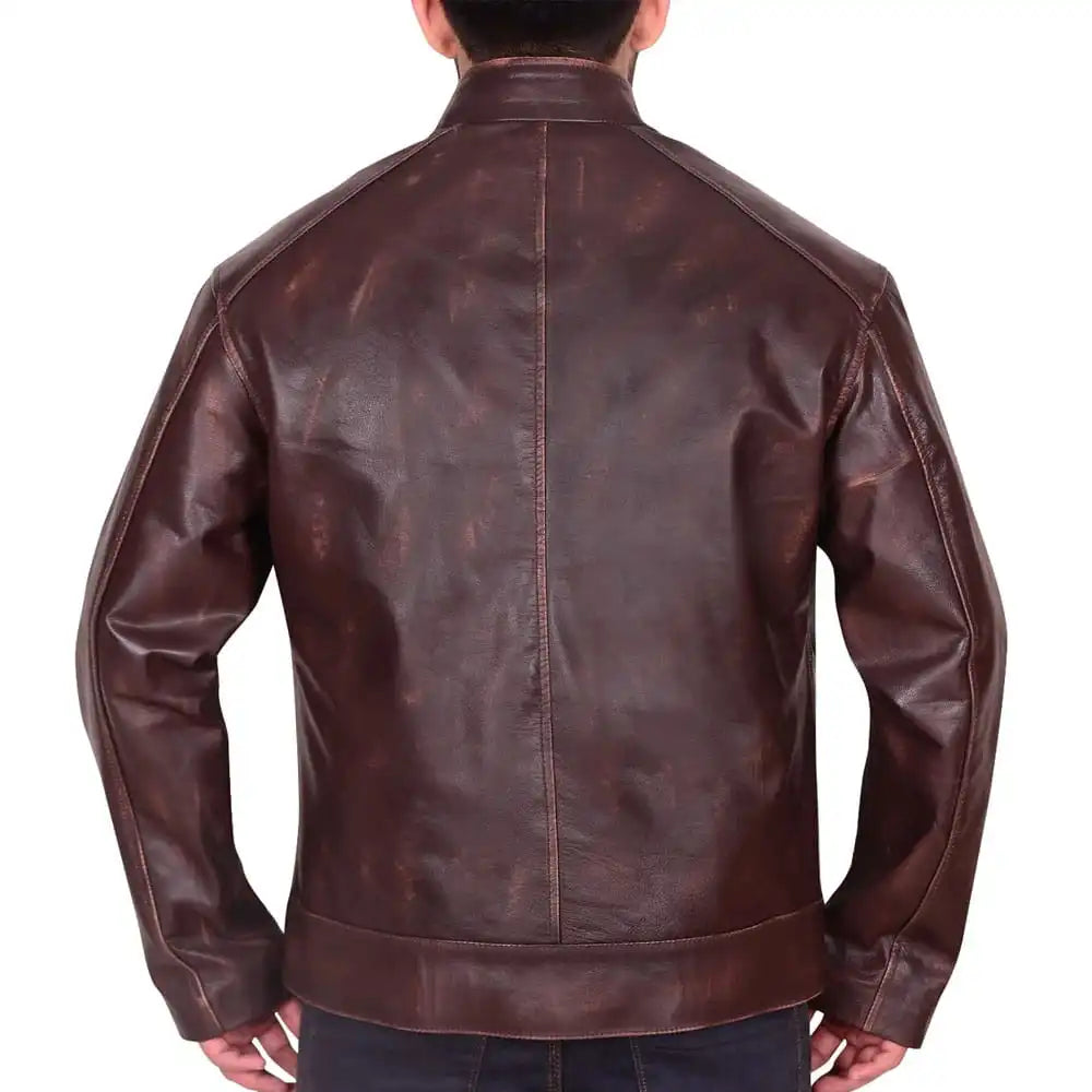 A man viewed from the back wearing a dark brown distressed leather jacket, set against a plain white background.