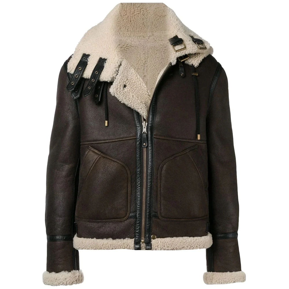 A dark brown leather aviator jacket with a thick cream-colored shearling lining on the hood, collar, and cuffs, featuring a front zipper, drawstring details, and large front pockets.