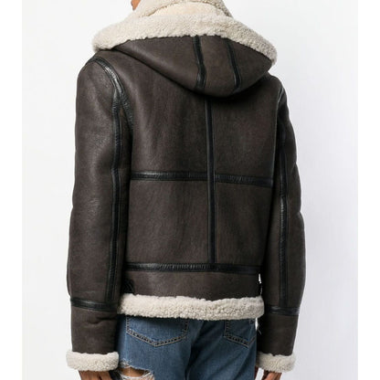 A dark brown faux-shearling hooded jacket with a cream-colored sherpa lining, shown from the back on a model wearing blue jeans against a plain white background.