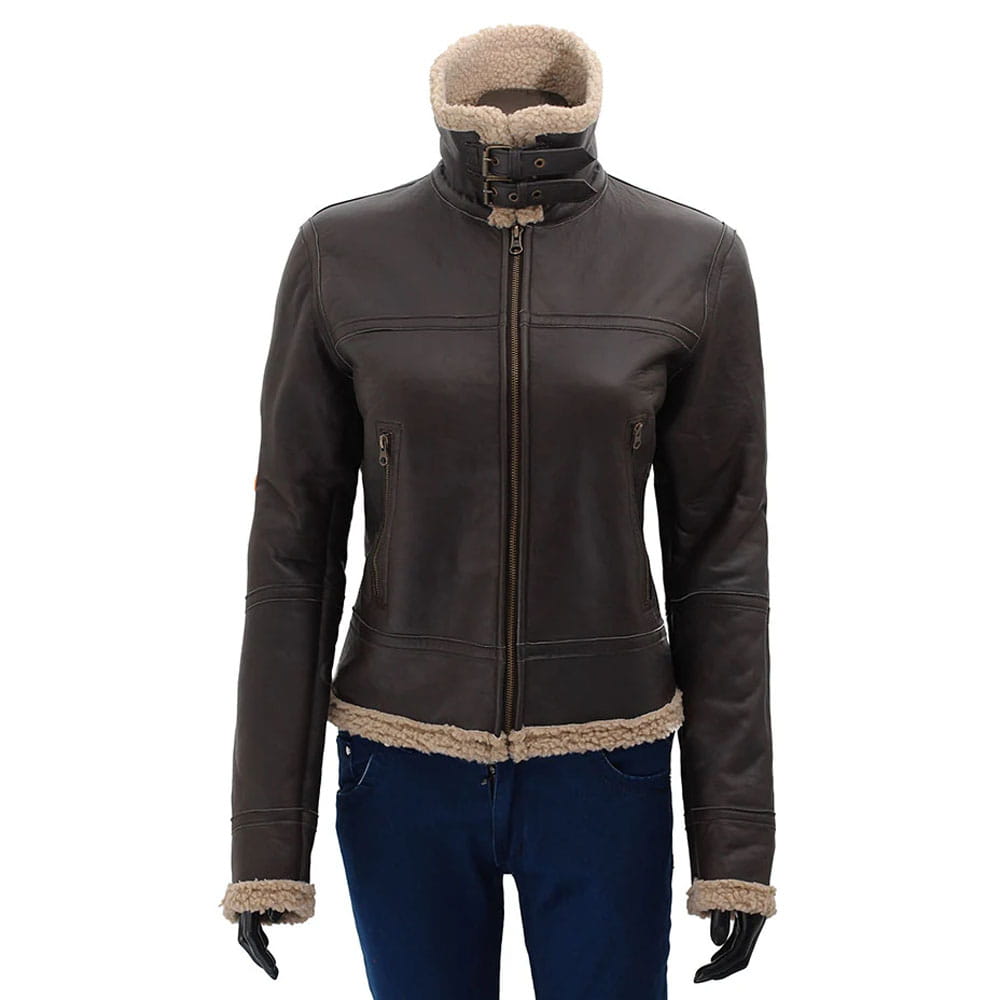 A dark brown faux-leather jacket with a beige sherpa lining, featuring a high collar, front zipper, and zippered side pockets, shown on a mannequin with blue jeans against a white background.