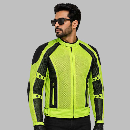 Man wearing a bright green and black motorcycle jacket on a gray background