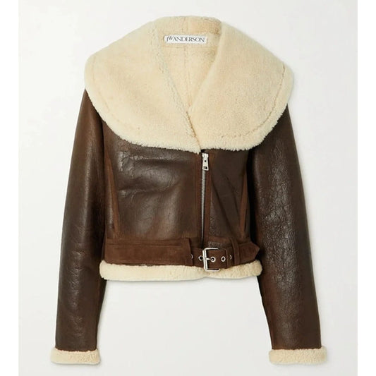 A cropped brown faux-leather aviator jacket with a large cream shearling collar, matching shearling trim at the hem and cuffs, and a front zipper closure.