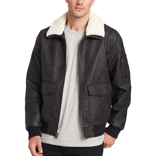 Black leather jacket with white fur collar worn by a person on a white background