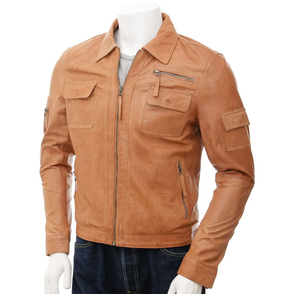 A tan leather jacket displayed on a white mannequin torso with dark blue jeans against a plain white background.