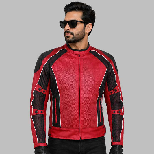 A man wearing a red and black motorcycle jacket with mesh panels, black sunglasses, and black pants, set against a solid gray background.
