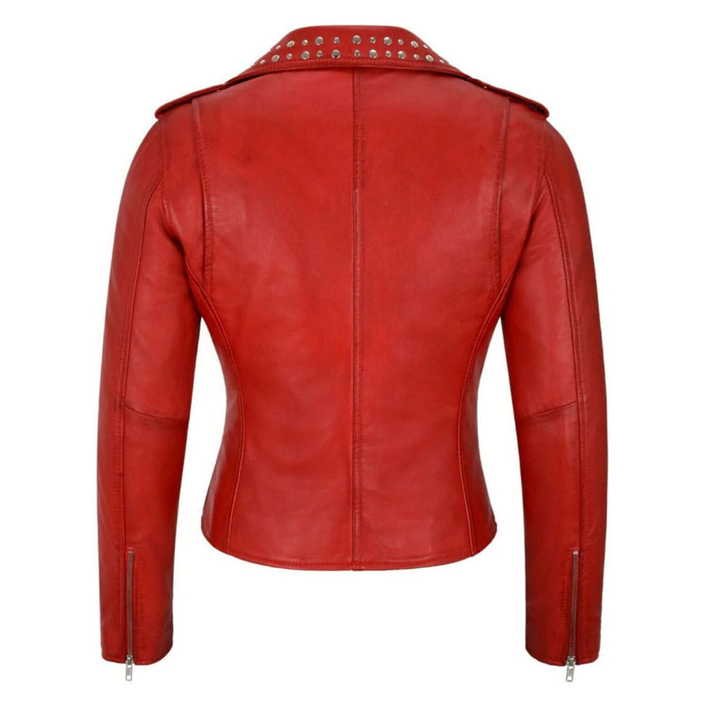 Red faux leather moto jacket shown from the back, featuring silver metal studs along the collar and zippered sleeve cuffs, on a solid white background.