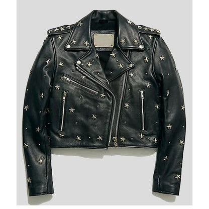 Black leather moto jacket embellished with silver star-shaped studs, displayed flat against a light gray background.