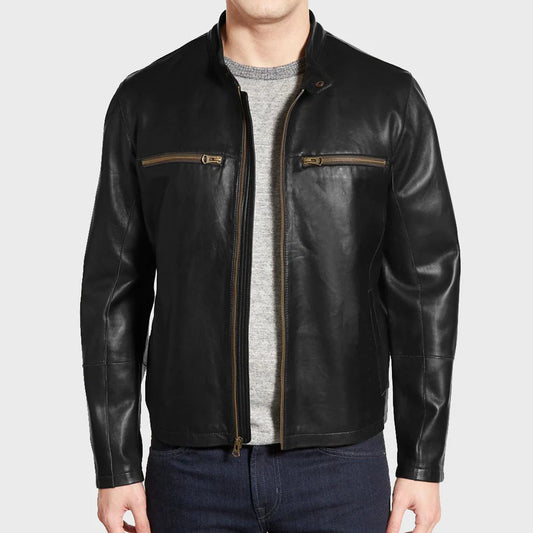 Black leather jacket worn by a person on a light gray background