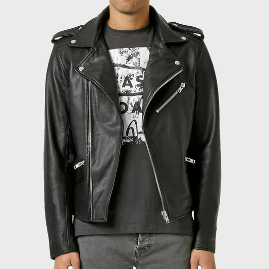 Person wearing a black leather jacket over a graphic t-shirt on a white background